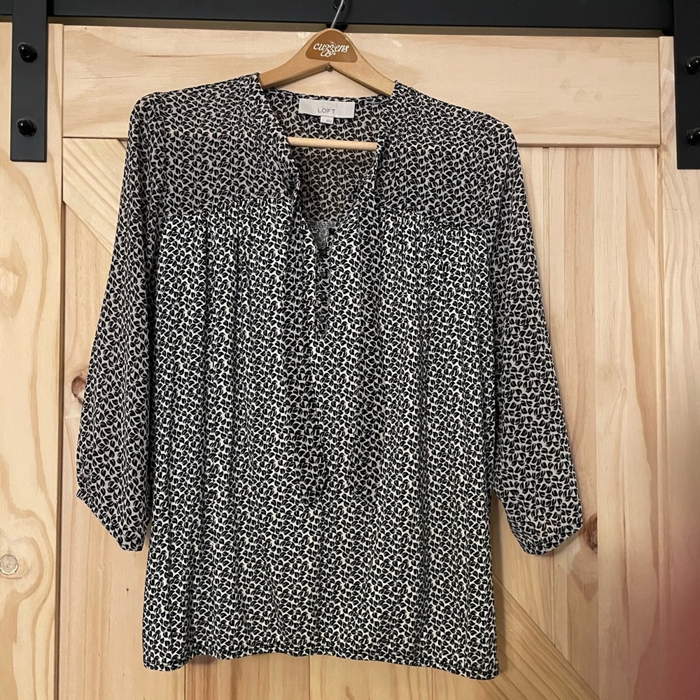 Black and white Loft 3/4 sleeve sheer blouse. Little cute black buttons.